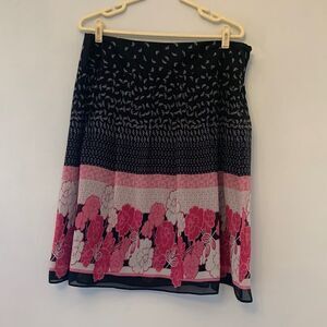 First Option pink and black floral skirt. Size 16 Length 24” Fully lined